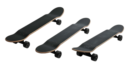 Three skateboards of varying lengths, all black, arranged on a dark background