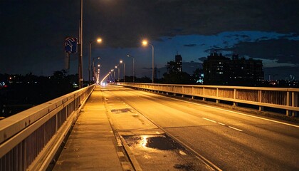 Grain silos beside railway tracks at sunset