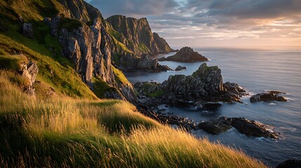 Coastal landscape A rugged coastline, cliffs, ocean, grass, and a sunset glow
