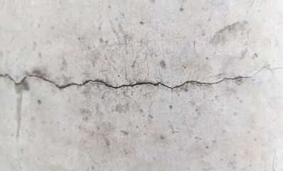Gray cracked concrete wall texture background