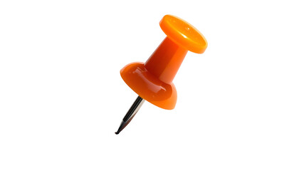 Close-up of a bright orange pushpin, casting a slight shadow on a solid black background