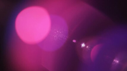 P128-Light leak overlay. Pink purple blurry light on a black background. Flare effect. Defocused Blur. Pe 4K 10s