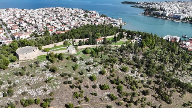 Aerial orbit shot circling Karababa Castle overlooking Chalkida and the Euripus Strait, Greece