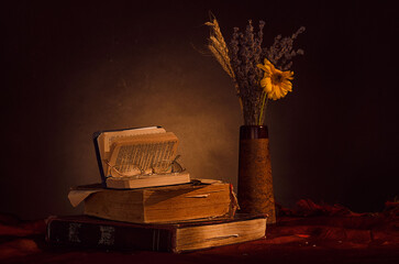 still life with books and candle © Grigore