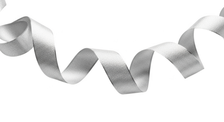 Silver ribbon curled and twisted against a png isolated transparent background black background white