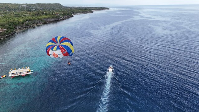 parasailing surfing in the sea