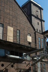 Industrial hall facade with clock tower
