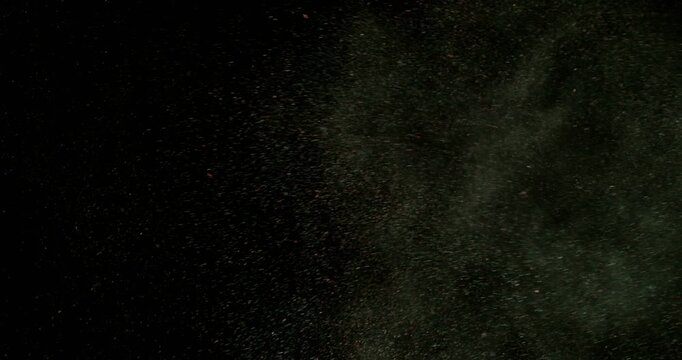 Super slow motion sandstorm and dust blizzard effect with airborne sand and fine particles, filmed at 500 fps on a high-speed camera. Isolated on black background, ideal as realistic VFX overlay.