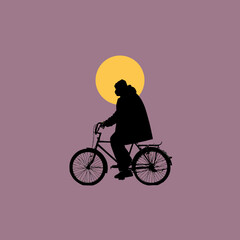 Silhouette of a person riding a bicycle with a yellow sun background