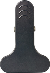 black plastic bulldog clip isolated white background, textured finish with embossed curved ridges, top view in close-up