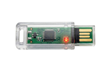 Transparent USB flash drive showing internal circuit board. Data storage device.