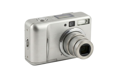 Silver compact digital camera with lens extended. Photography equipment.