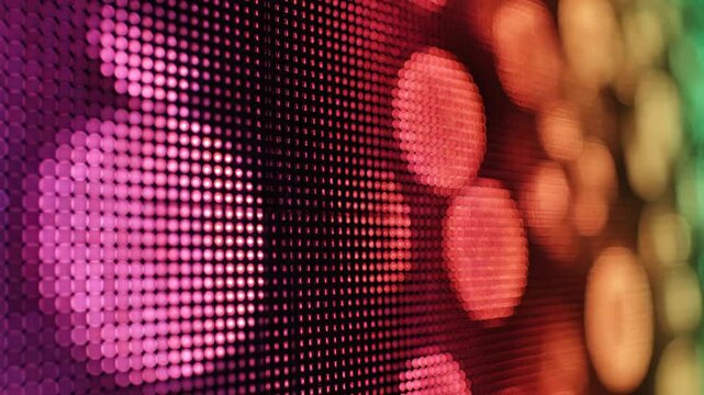 LED Display Abstract Close-up - This macro shot showcases an LED screen with a blurred focus, creating an abstract pattern of light.