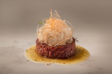 Quiet tartare moment caught as warm studio glow meets chilled Nordic tenderness in contrast