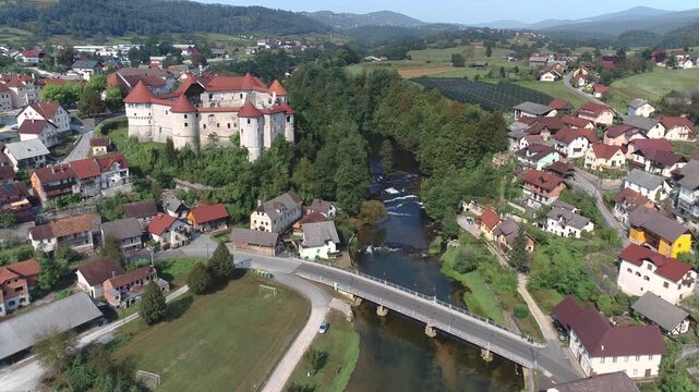 Aerial view of Žužemberk Castle above the Krka River in Slovenia