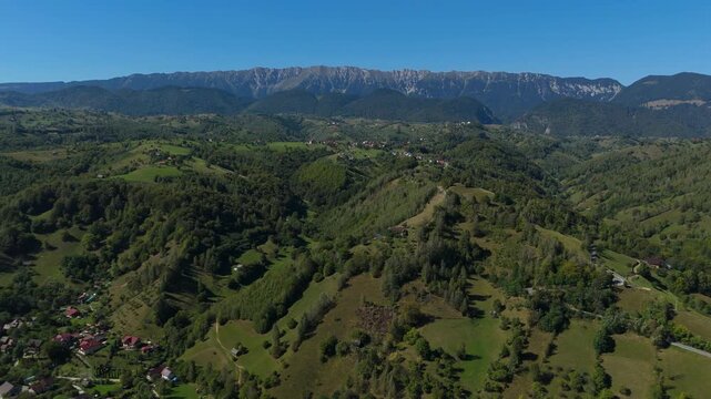 Majestic Aerial Flight over Magura and Pestera Villages towards Piatra Craiului Southern Ridge