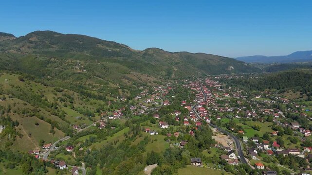 Expansive Aerial Panorama of Moieciu de Jos and Piatra Craiului Mountains over Magura and Pestera Villages