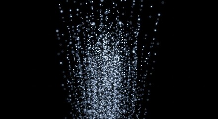 Abstract glitter cascade creating a mesmerizing effect on a dark background