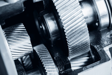 Close-up of cnc milling machine gears, precision engineering and metalwork technology