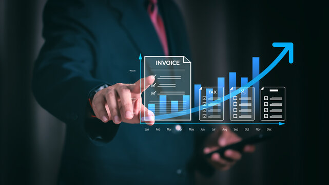 Business finance technology concept. Executive using digital interface for e-invoicing, tax management, and data analysis to drive economic profit and future corporate market success. - Powered by Adobe