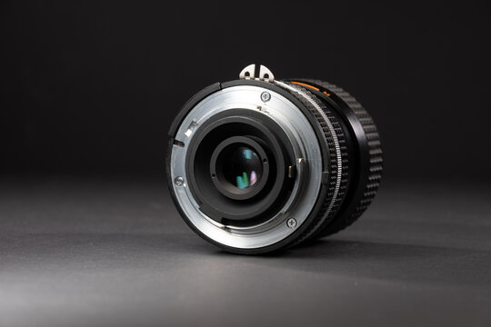 Rear mount view of vintage Nikon Nikkor 35 70mm zoom camera lens.