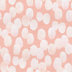 Textured pattern of white spots on  salmon background.