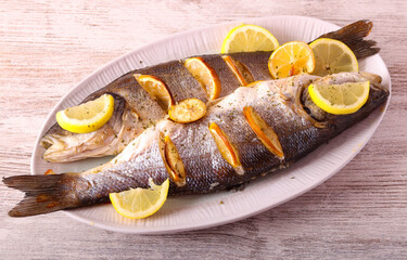 Baked lemon sea bass fish