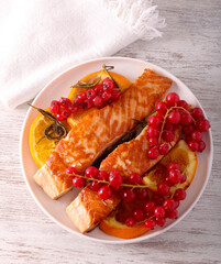 Salmon with orange and currant