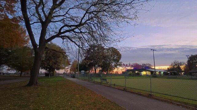 POV View of Kew Beach Lawn Bowling Club at Sunset, Toronto, Trees and Path