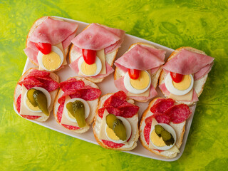 Homemade chlebicky on tray top view