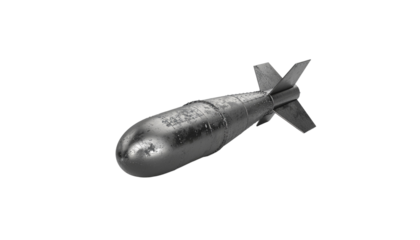 A gray bomb with fins is angled to the right in a high angle shot with soft edges and a light background on white and transparent
