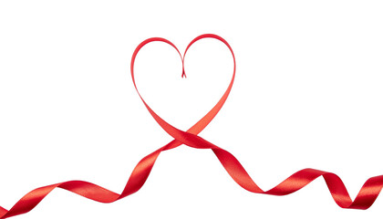 Red ribbon forms a heart shape and swirls across the surface in a decorative pattern, creating a romantic design on white and transparent