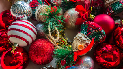 Box filled with colorful Christmas ornaments and decorations