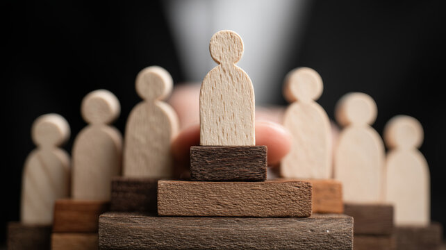 Wooden figure displayed beside a hot cheburek samsa in foil packaging