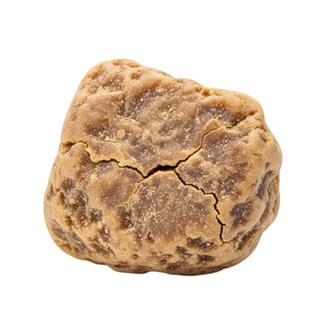 Asafoetida or hing lump spice isolated on white background, pungent resinous seasoning used in Indian cooking