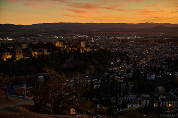 Fototapeta premium Panoramic night view of the Alhambra and Granada city from San Miguel Alto viewpoint