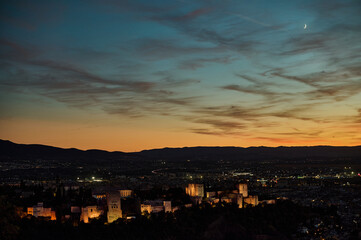 Fototapeta premium Panoramic night view of the Alhambra and Granada city from San Miguel Alto viewpoint