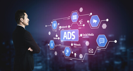 A businessman stands contemplating digital advertising concepts, surrounded by various icons representing social media, networking, and marketing strategies in a modern city setting. Tessel