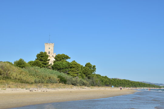 The sandy beach of Pineto (Italy) With the famous tower castle called Torre di Celano. 