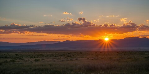 Sunset over highlands south of Butte MT, natural landscape with warm light, seasonal change