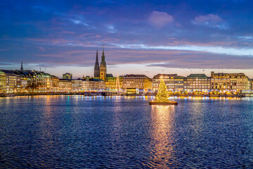Fototapeta premium Hamburg, Germany. The lake Alster downtown in the evening around Christmas.