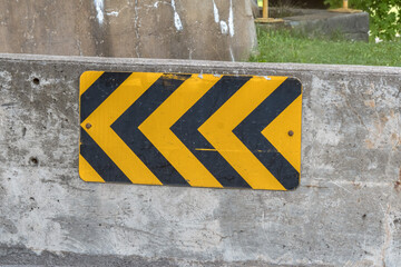 A yellow traffic sign