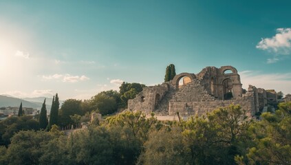 Historic city remains featuring stone structures surrounded by greenery, archaeological conservation