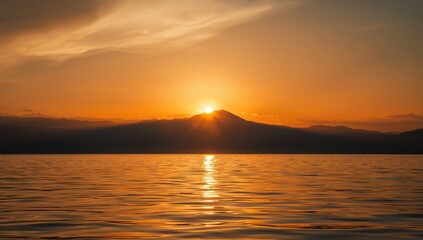 Sunset scene at a lake with mountain silhouette, natural lighting for scenic photography, Earth Day
