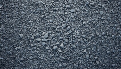 Grey hard texture of scree and road-metal serving as a durable background for architectural layouts