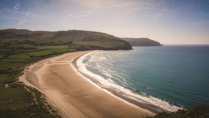 Rhosili Bayâ€™s rugged shoreline with tide pools and cliffs, serving as a coastal erosion site