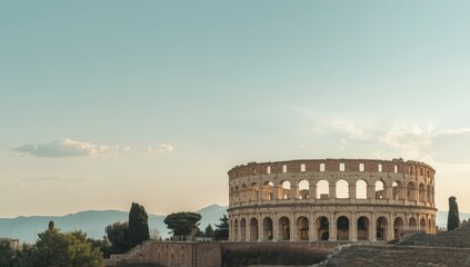 Ancient stone Roman amphitheater structure in a historic landscape setting, tourism in Turkey
