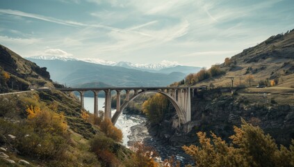 Obraz premium High-altitude bridge crossing in Georgia's mountainous terrain, focusing on engineering amid natural features