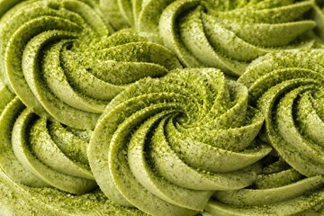 Detailed close shot showing the textured pattern of a green tea dessert