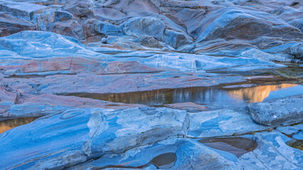 Amazing landscape background with colorful rocks and water reflection
